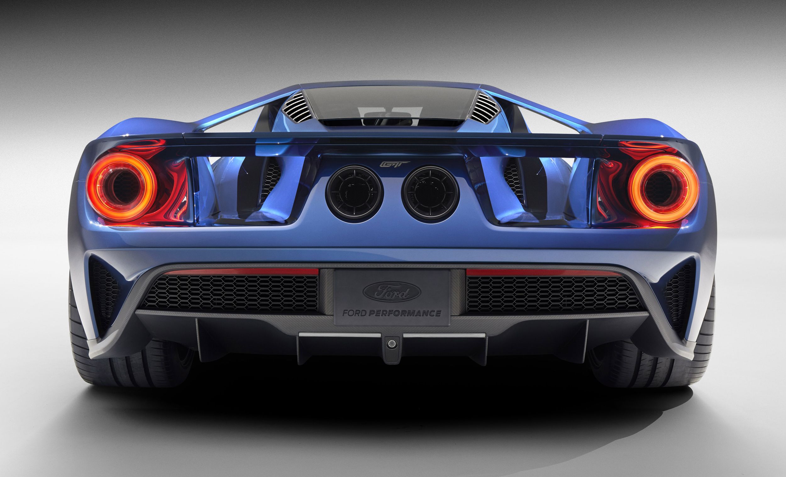 The all-new carbon-fiber Ford GT supercar features fully active aerodynamic components to improve braking, handling and stability, including an active rear spoiler keyed to both speed and driver input.